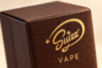Suizz chocolate packaging branding detail, styled photograph